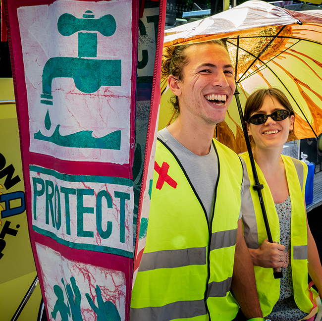 Two activists at the Stop Zenith parade.